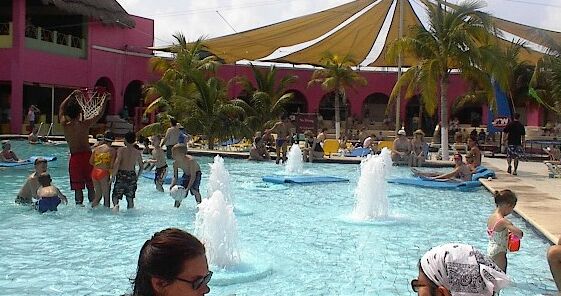 A huge swimming pool in the middle of this open air mall.  Neat, huh?